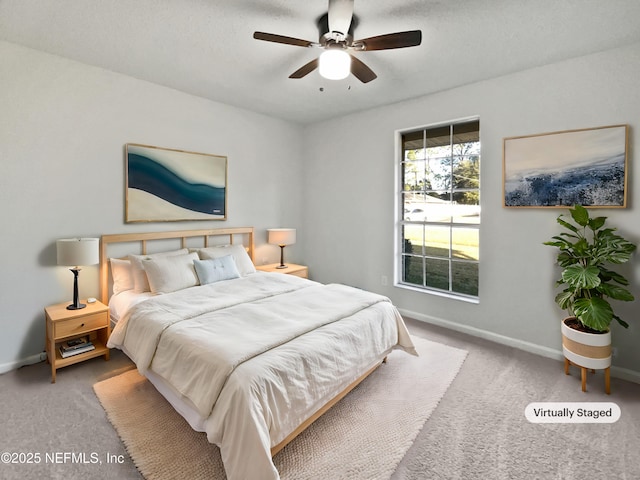 bedroom with carpet floors and ceiling fan