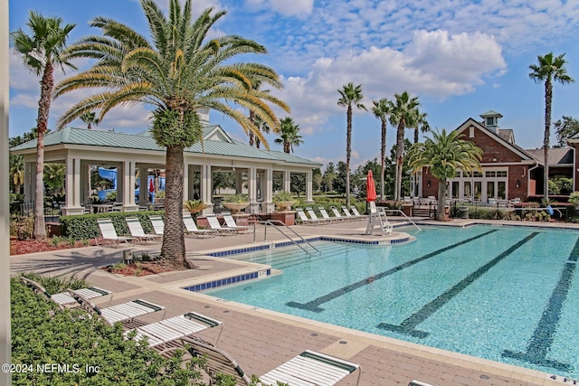 view of pool featuring a patio area