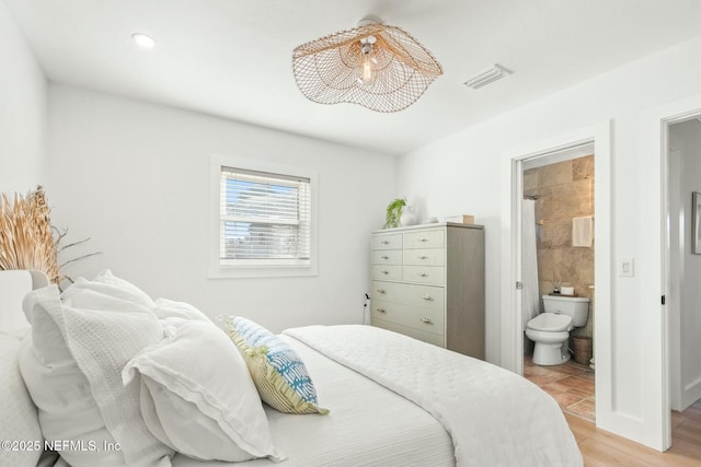 bedroom featuring ensuite bathroom