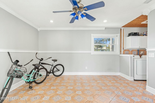 interior space featuring light tile patterned floors, ceiling fan, crown molding, and washing machine and clothes dryer