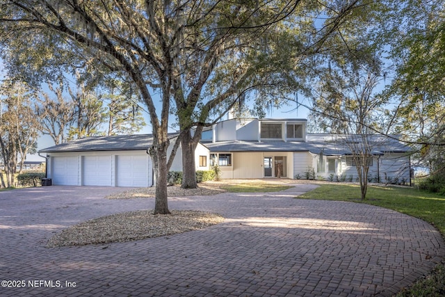 view of front of property featuring a garage