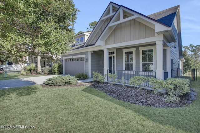 craftsman-style house with covered porch and a front yard