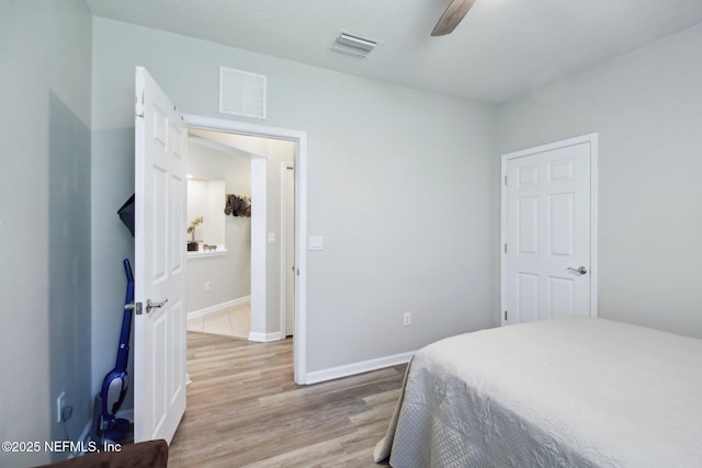 bedroom featuring ceiling fan and light wood-type flooring