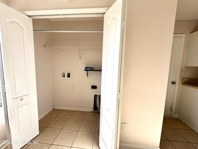 laundry room featuring light tile patterned floors, washer hookup, and hookup for an electric dryer