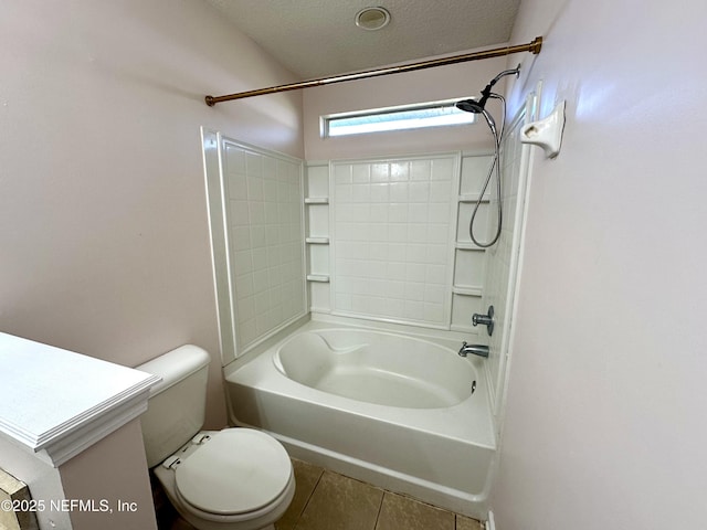 bathroom featuring shower / tub combination, tile patterned floors, a textured ceiling, and toilet