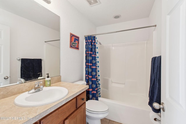 full bathroom with tile patterned flooring, vanity, shower / tub combo, and toilet