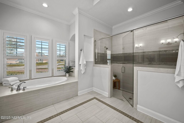 bathroom with a wealth of natural light, tile patterned flooring, ornamental molding, and shower with separate bathtub