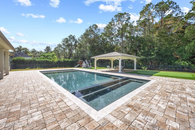 view of pool featuring a gazebo, a patio area, and a yard