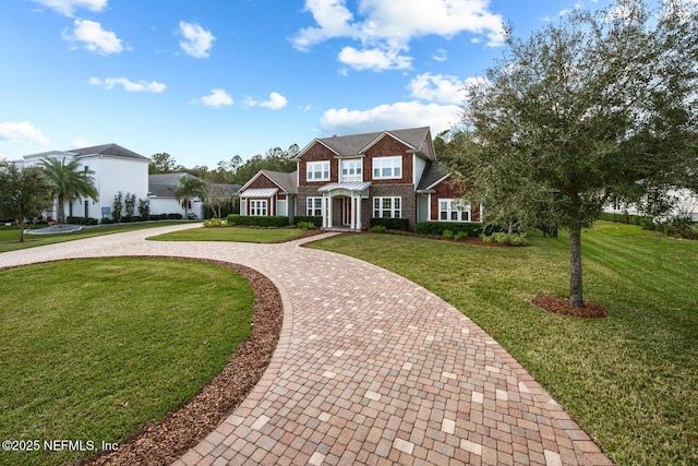 view of front facade with a front yard