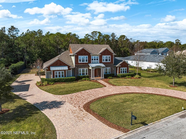 view of front of home with a front lawn