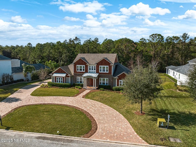 view of front facade with a front yard