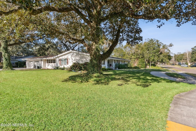 view of front of home with a front lawn