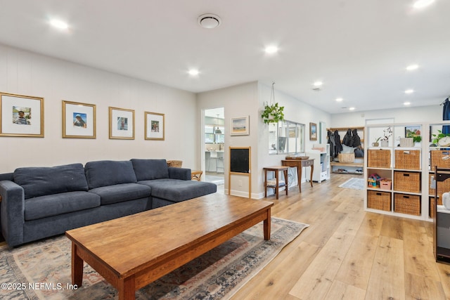 living room with light hardwood / wood-style floors