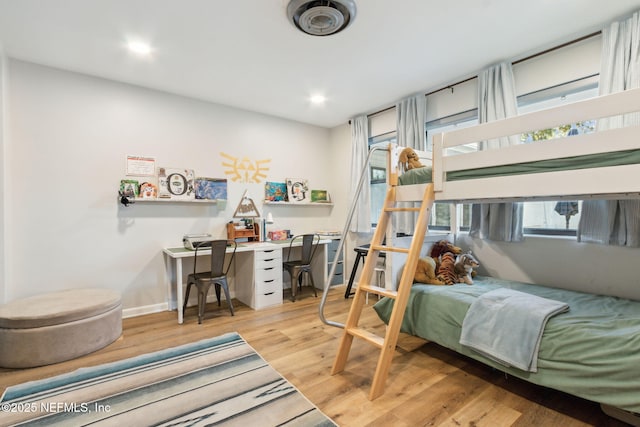 bedroom featuring light wood-type flooring