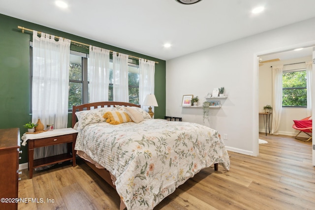 bedroom with light wood-type flooring