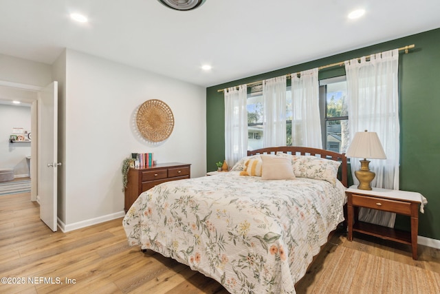 bedroom featuring light hardwood / wood-style flooring