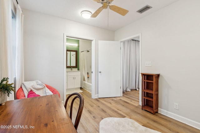 office area featuring light hardwood / wood-style floors and ceiling fan