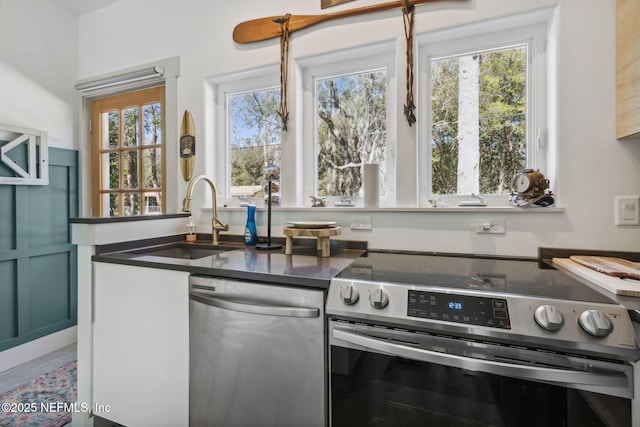 kitchen featuring stainless steel appliances and sink