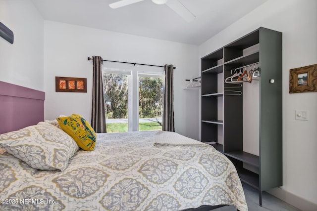 bedroom with ceiling fan and a closet