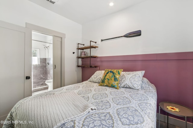 bedroom featuring connected bathroom