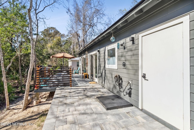 view of patio with a deck