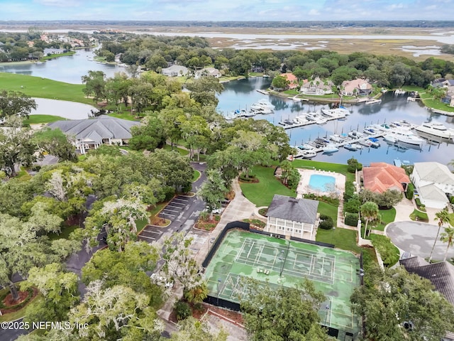 birds eye view of property featuring a water view