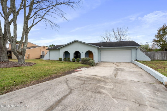 ranch-style house with a front lawn and a garage