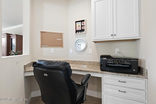 tiled office space with built in desk