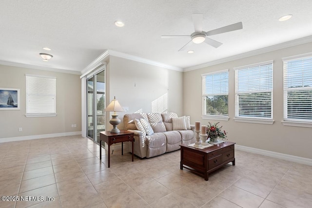 living room with ceiling fan, light tile patterned floors, and crown molding