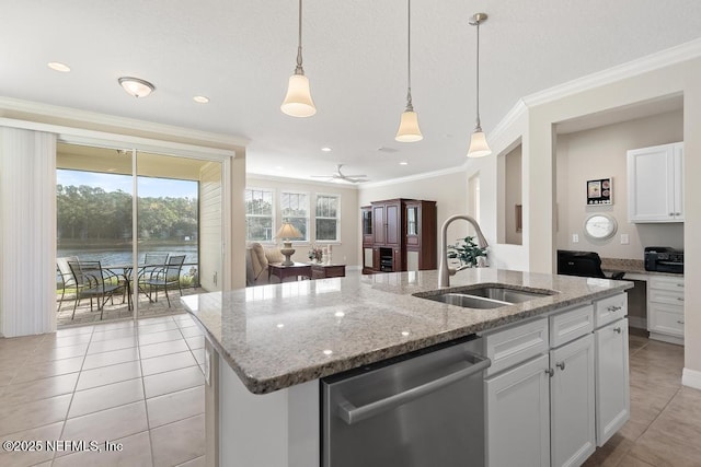 kitchen with a center island with sink, a water view, sink, stainless steel dishwasher, and white cabinetry