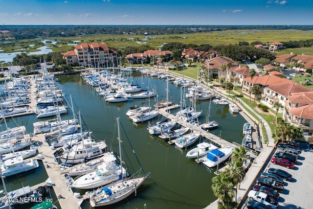 birds eye view of property featuring a water view