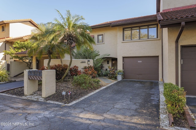 view of front of property with a garage