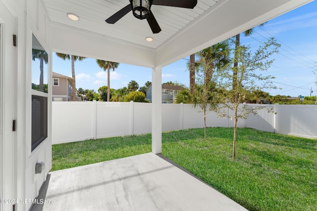 exterior space with ceiling fan and a patio area