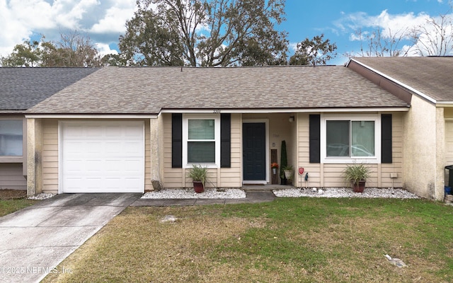 single story home with a front yard and a garage