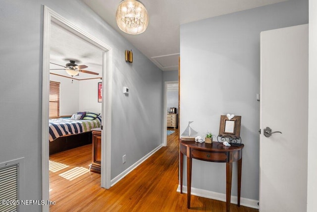 hall featuring wood-type flooring