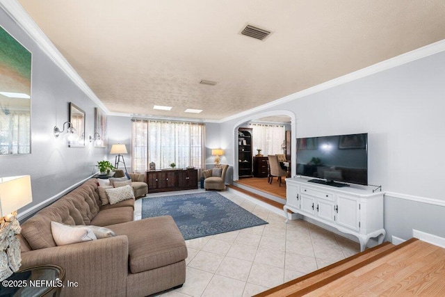 tiled living room with crown molding