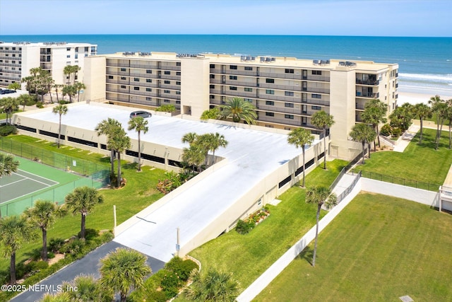 bird's eye view with a beach view and a water view