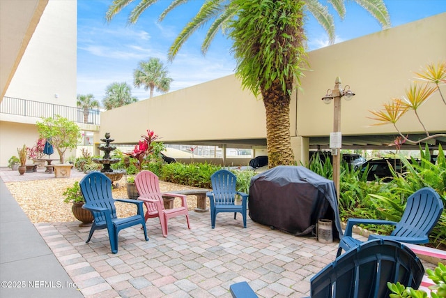 view of patio with a grill