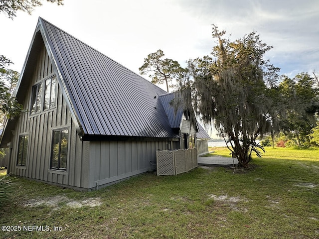 view of property exterior featuring a yard