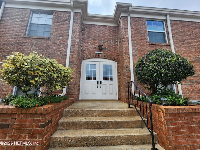 view of exterior entry with french doors