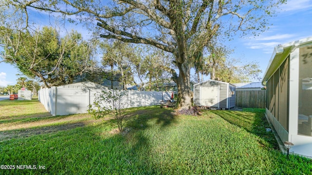 view of yard with a storage unit