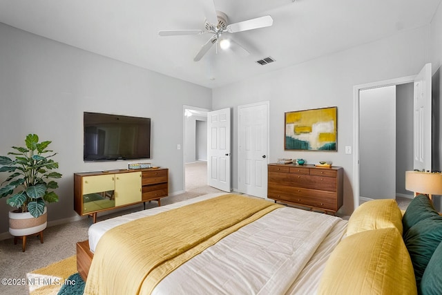 bedroom featuring ceiling fan and light carpet