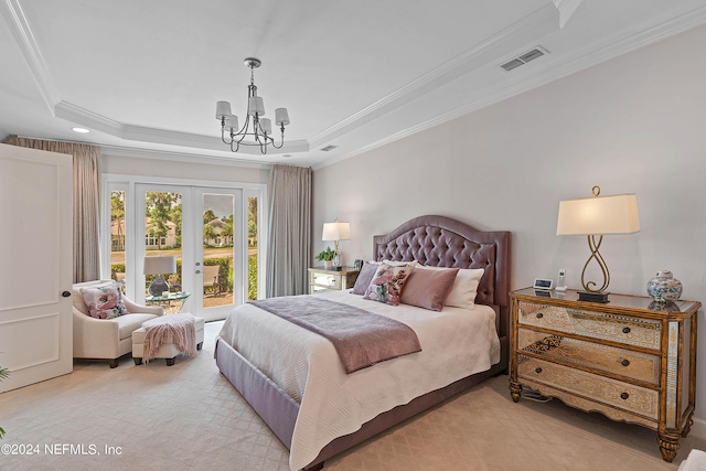 bedroom with french doors, crown molding, a tray ceiling, light colored carpet, and access to exterior