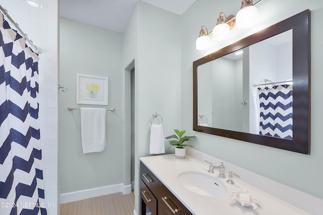 bathroom with vanity and a shower with curtain