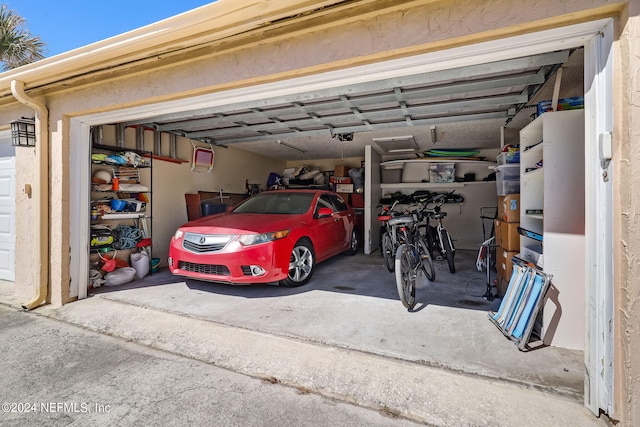 garage featuring a garage door opener