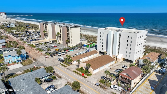 aerial view with a view of the beach and a water view