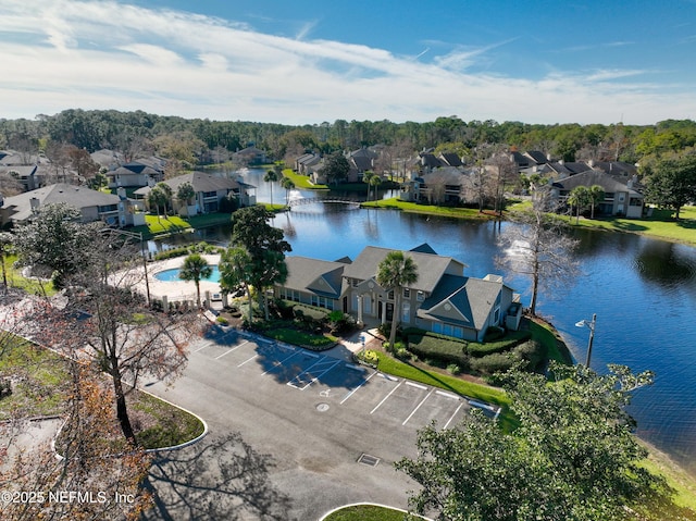 drone / aerial view with a water view