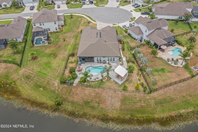 bird's eye view with a water view