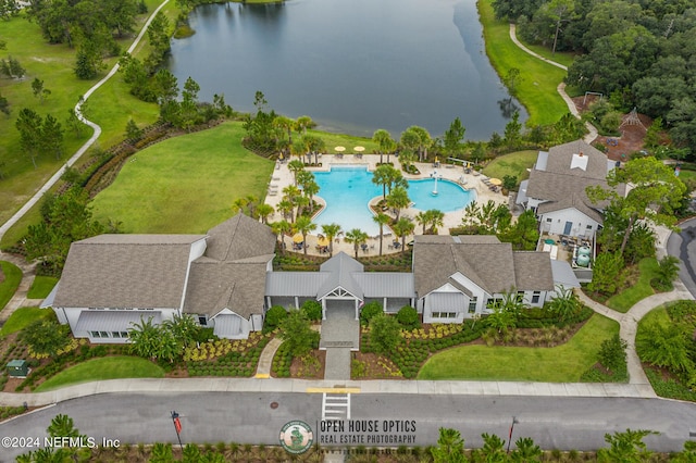 drone / aerial view with a water view