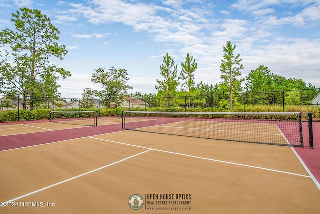 view of sport court featuring basketball hoop